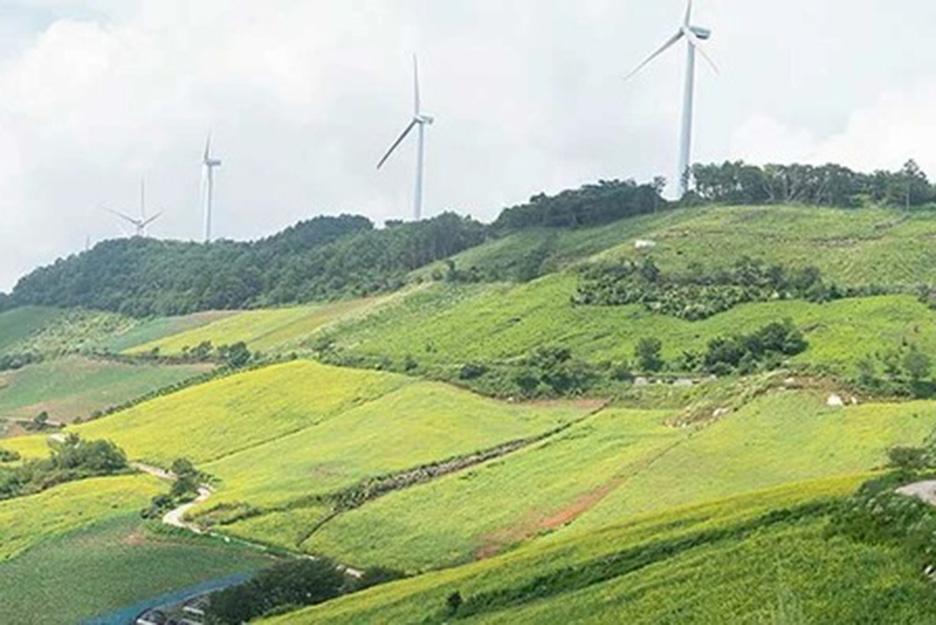 Green landscape with windmills