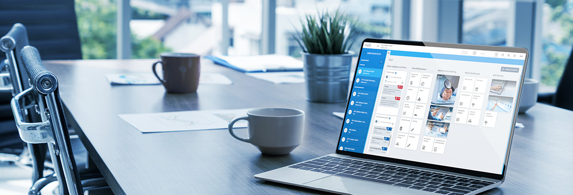 Laptop with accounting software on a table.