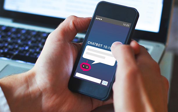 Man uses Magenta Smart Chat on his smartphone