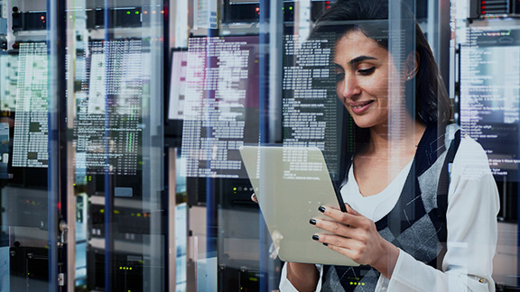 A woman working with a tablet.