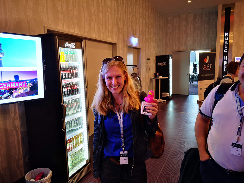 Woman with magenta duck trophy