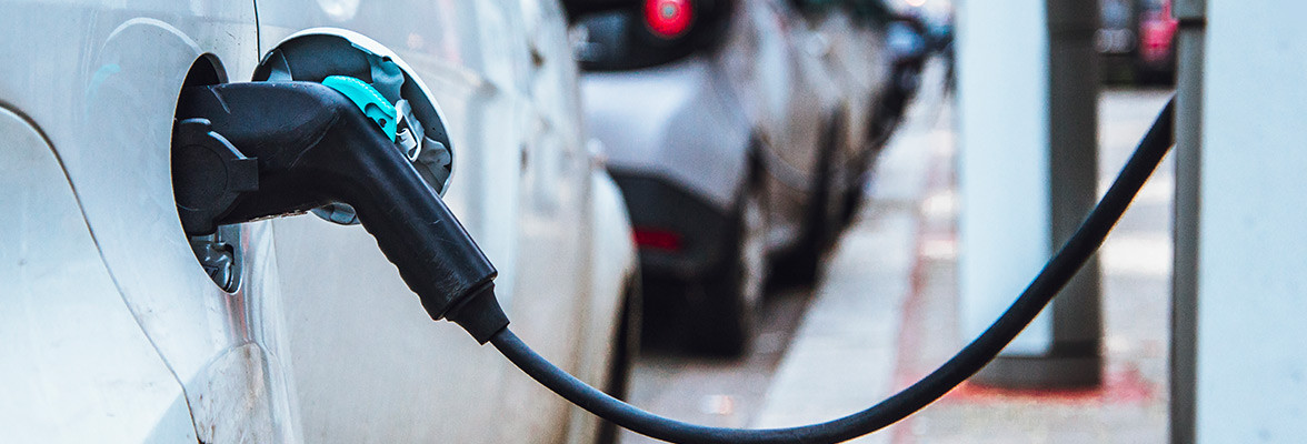 An e-car at a charging station 