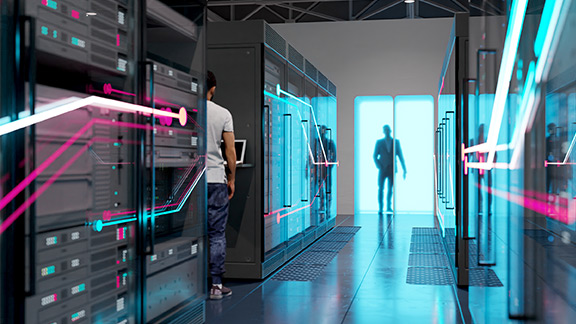 A modern data center with people inside.