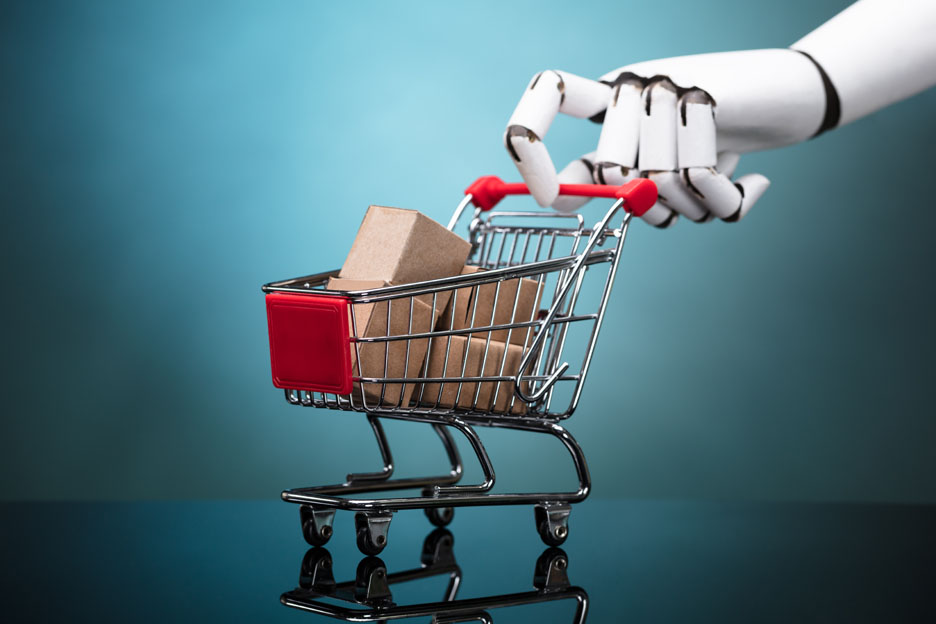 Artificial intelligence in retail (Robot hand pushes shopping cart.)