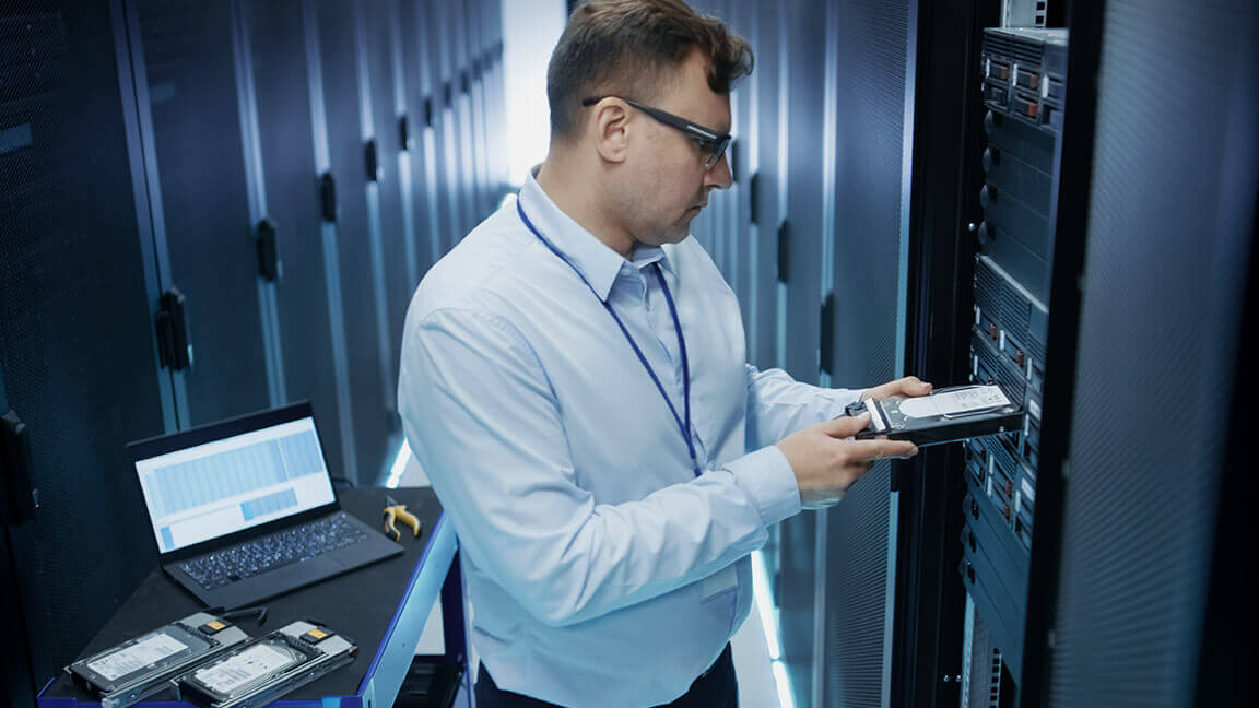 A man stands in the server room